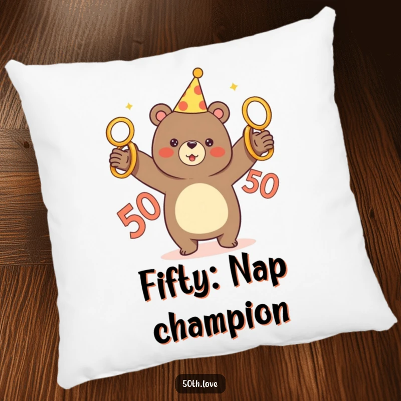 Funny pillow showing a bear in a party hat masterfully juggling five golden rings, with the number 50 prominently displayed.