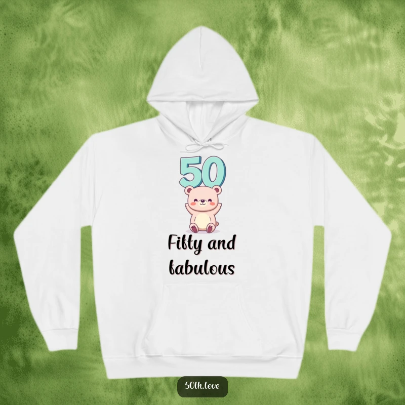 Funny 50th birthday hoodie showing a cheerful bear balancing the number 50 on its head, great for staying warm and festive.